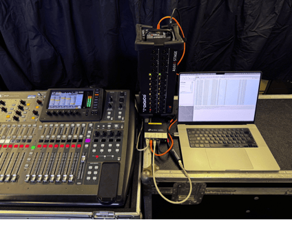 Behringer X32 sound console, DiGiCo A168D stage box, and a MacBook all connected to a network switch.